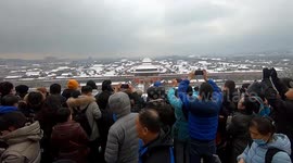 Beijing's first winter snow draws crowds to view snow-covered Forbidden City