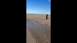 Woman splashed with a wave of embarrassment after courageous jump attempt backfires!