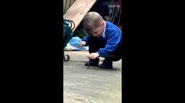 Poor worm gets cold treatment before being YEETED by a curious kid
