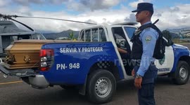 Police transport bus crash victim's coffin after fatal accident that claimed 12 lives