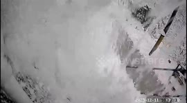 Quick-thinking Chinese father saves daughter from being buried alive under sudden roof snow collapse