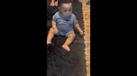8-month-old baby takes a tumble after cactus toy scares him GOOD!