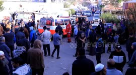 People mourn those killed in Israeli airstrike in Rafah