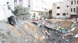 The effects of the Israeli bombing on a house belonging to a Harb family, which led to martyrs and missing persons under the rubble in Rafah.