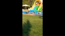 Man Overturns Inflatable Slide
