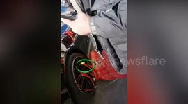 Bride's family and friends padlock groom's Porsche and demand cigarettes to release