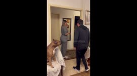 Brave dog having none of playful slapping prank on his owner