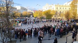 Climate change activists of Extinction Rebellion (XR) group in action for Palestine in the Madrid center on 13 December, 2023.