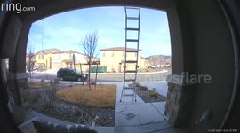 Man Falls From Roof and Deftly Rolls Into His Landing