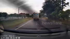 Motorcycle rider, 14, slams into truck turning at junction in Thailand