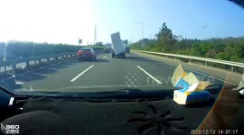 Car crushes over mattress fallen from truck on Chinese highway