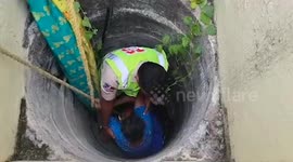 Fire officials rescue woman from well foiling her suicide attempt in Krishna Nagar, India