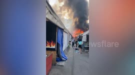 Fire ravages popular tourist market in Bangkok, Thailand