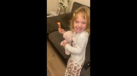 Girl goes from brimming with excitement to being on the verge of crying after seeing her gift from naughty elves