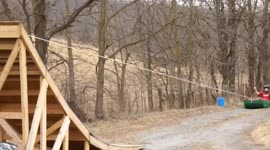 Man catapults himself and a canoe over a car, before flipping on his face!