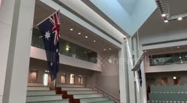 Higher tax earnings slash Australian budget deficit
