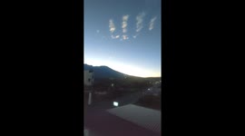 Clouds seemingly spell out Allah in Arabic over volcano Mount Marapi