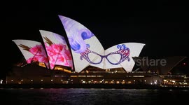 Sydney Opera House lights up in memory of Barry Humphries