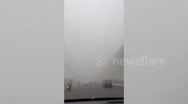 Bangkok roads obscured by heavy smog from seasonal crop burning