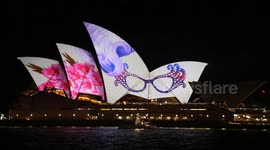Sydney Opera House lights up in memory of Barry Humphries