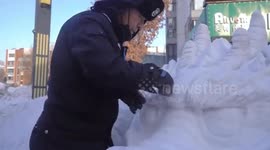 Chinese security guard stuns with magnificent 5-metre dragon sculpture out of snow