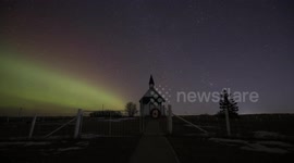 Aurora Borealis over a Canadian Church showing on the northern lights