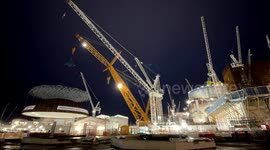 World's largest crane lifts steel dome onto Hinkley Point C's first reactor building in Somerset, UK