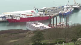 Vigil held outside Portland Port as campaigners mourn death of migrant in Dorset, UK