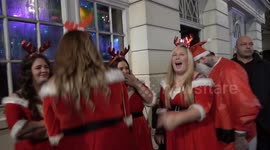 Christmas spirits high as Birmingham festive revellers pack the city's infamous Broad Street nightclub strip in fancy dress