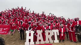 Dutch surfers enjoy annual Surfing Santas event