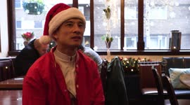 Skaters take over London streets wearing Santa outfits to provide festive cheer