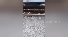 The goods train passed overhead but the young man was not even scratched, he could have lost his life due to the shortcut