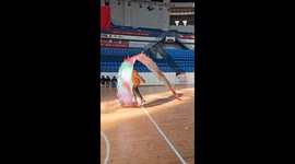 Dragon dancer takes a spill during traditional dragon lantern dance in Hunan, China