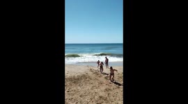 Heroic lifeguards use winch to rescue struggling swimmer in Argentina