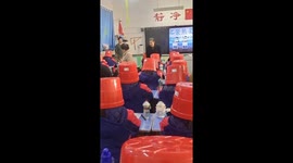 Chinese parents bond in unique stool challenge with children