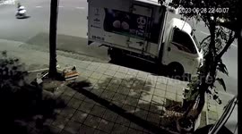 The woman was driving a motorbike while using her phone and crashed into the back of a truck parked on the side of the road