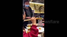 Chinese diner discovers rusted knife floating in hotpot
