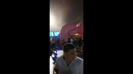 Storm Sends Pink Bear Flying Through Crowd of Fleeing Festival-Goers