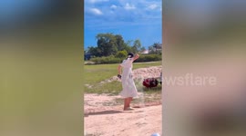 Kind Buddhist monks help push car out of ditch