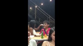 Touching moment daughter lovingly feeds her blind father at restaurant