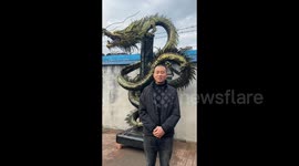 Intricate Chinese Dragon Sculpture Crafted from Recycled Tires Amazes People in Zibo, Shandong, China