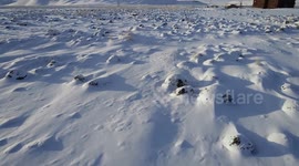 The snow-covered Mingsha Mountain in Hami, China