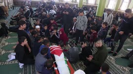 Palestinians mourn the bodies of Aziz  Akhlail, 20, and n the village of Beit Ummar, in Hebron