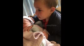 Boy cries when he meets his baby sister for the first time