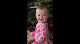 Pre-Christmas Surprise: 10-Month-Old caught unwrapping gift!