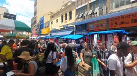 imagens aéreas da rua 25 de março, pessoas vem de todos os lugares do Brasil pra fazer suas compras aqui