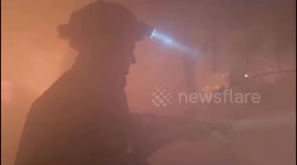 Firefighters extinguish flames as Russia attacks infrastructure in Kherson