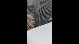 December 18, Shenzhen, Guangdong. China Construction First Engineering Co., Ltd. owed workers wages, and two helpless workers sat on the rooftop of the building to ask for wages.