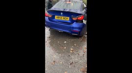 Horrible aftermath of a BMW crashing into a tree during rain