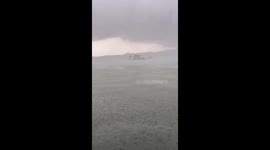 Visitors scramble for cover as storm batters boating lake in China
